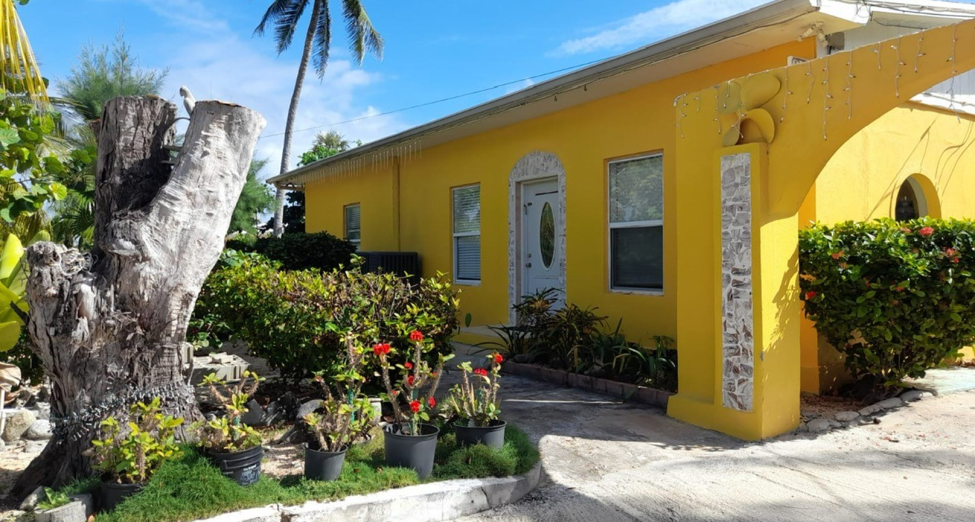 Cayman Brac Beach Front Home and Parcel of Land
