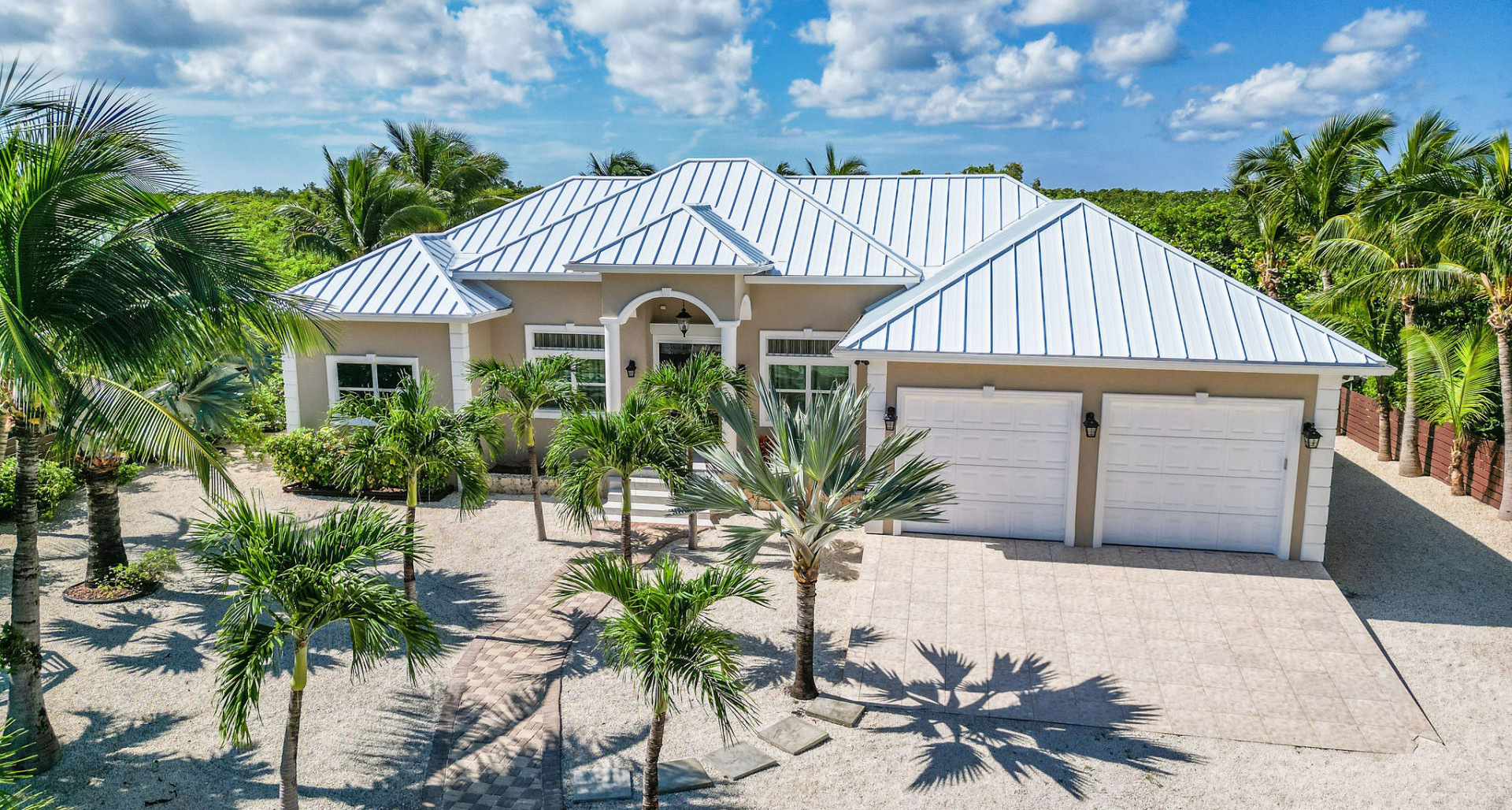 West Bay Duplex with 8 car garage