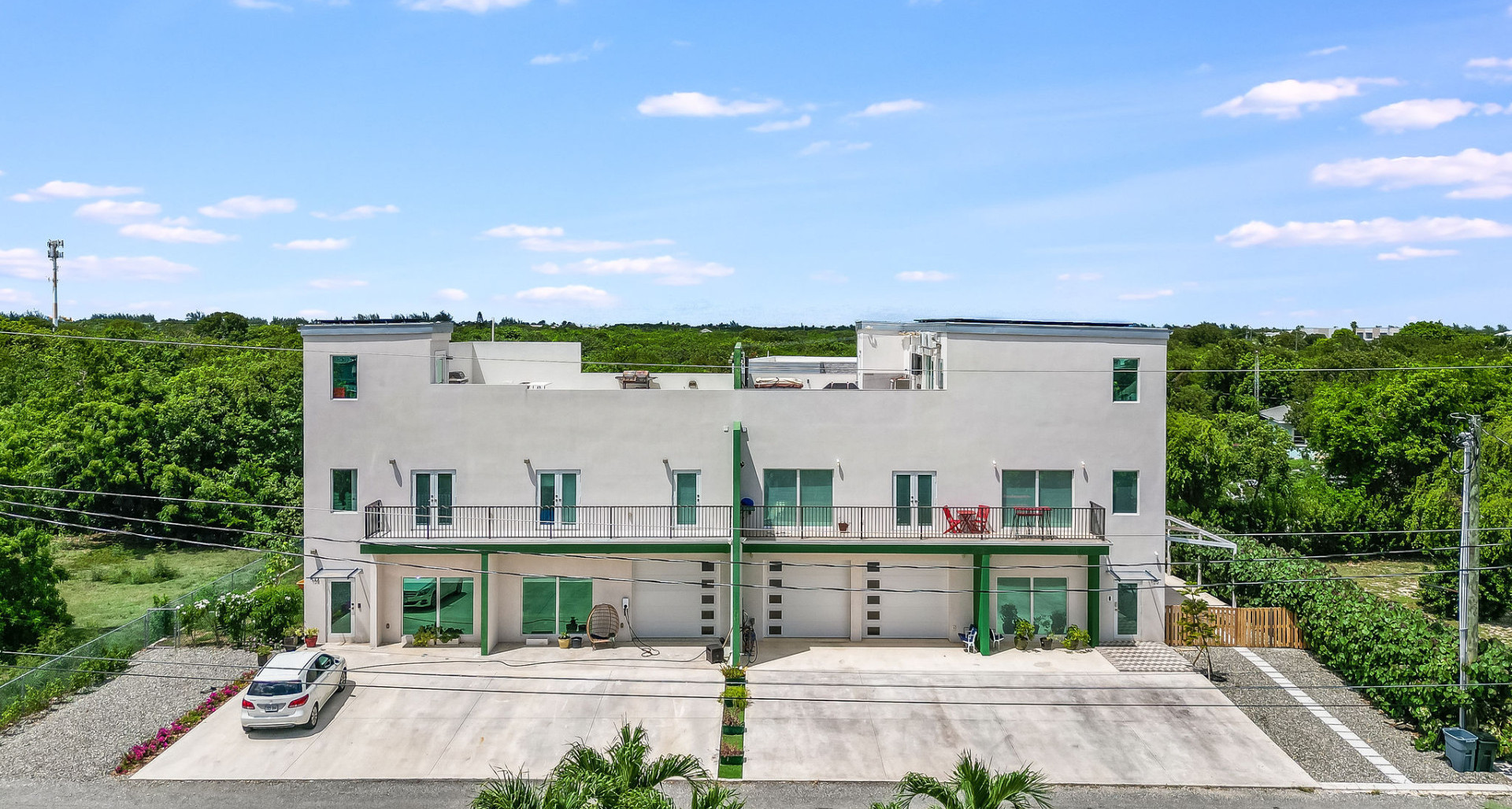 3-Story Duplex with 8-Car Garage & Rooftop Oasis image 3