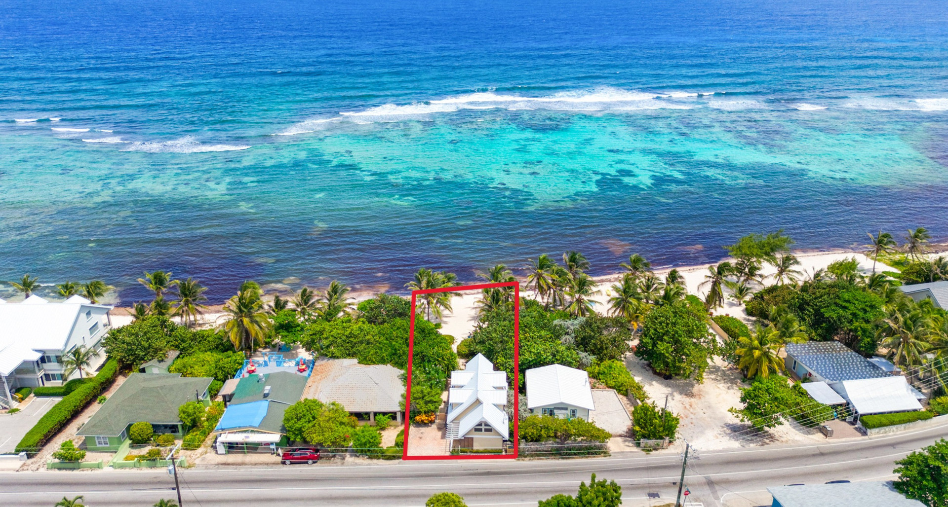 SERENITY SANDS | DUAL VALUE: CHARMING BEACHFRONT RETREAT WITH REVENUE STREAM image 1