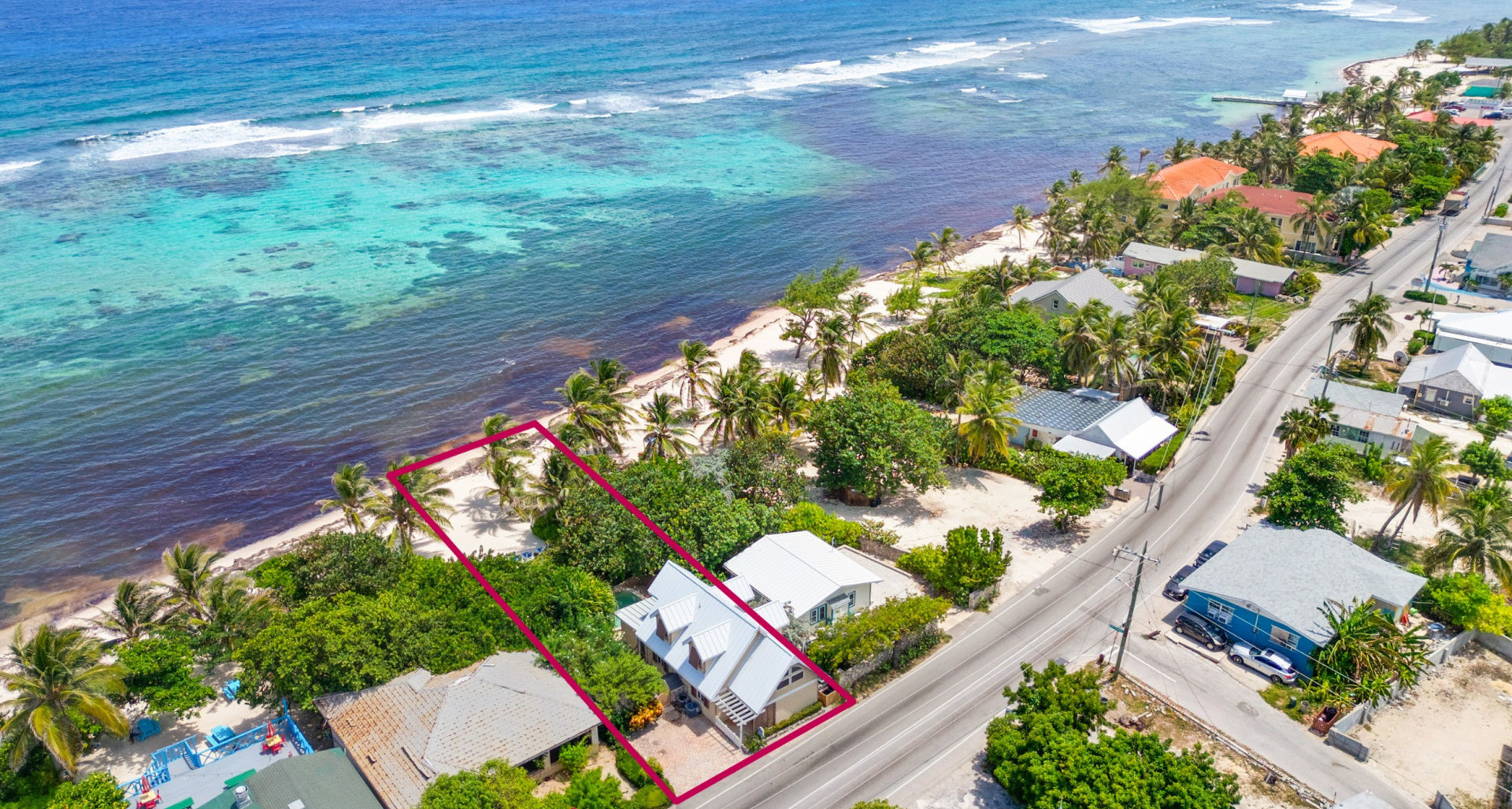 SERENITY SANDS | DUAL VALUE: CHARMING BEACHFRONT RETREAT WITH REVENUE STREAM image 2