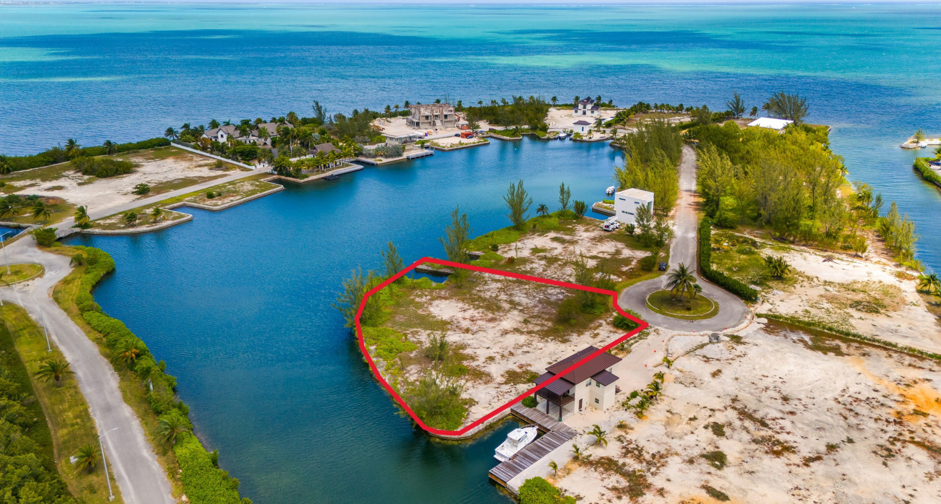 QUEEN’S HIGHWAY | EAST END – RARE PRIVATE BEACHFRONT LAND WITH APPROVED PLANNING, 0.61 ACRE
