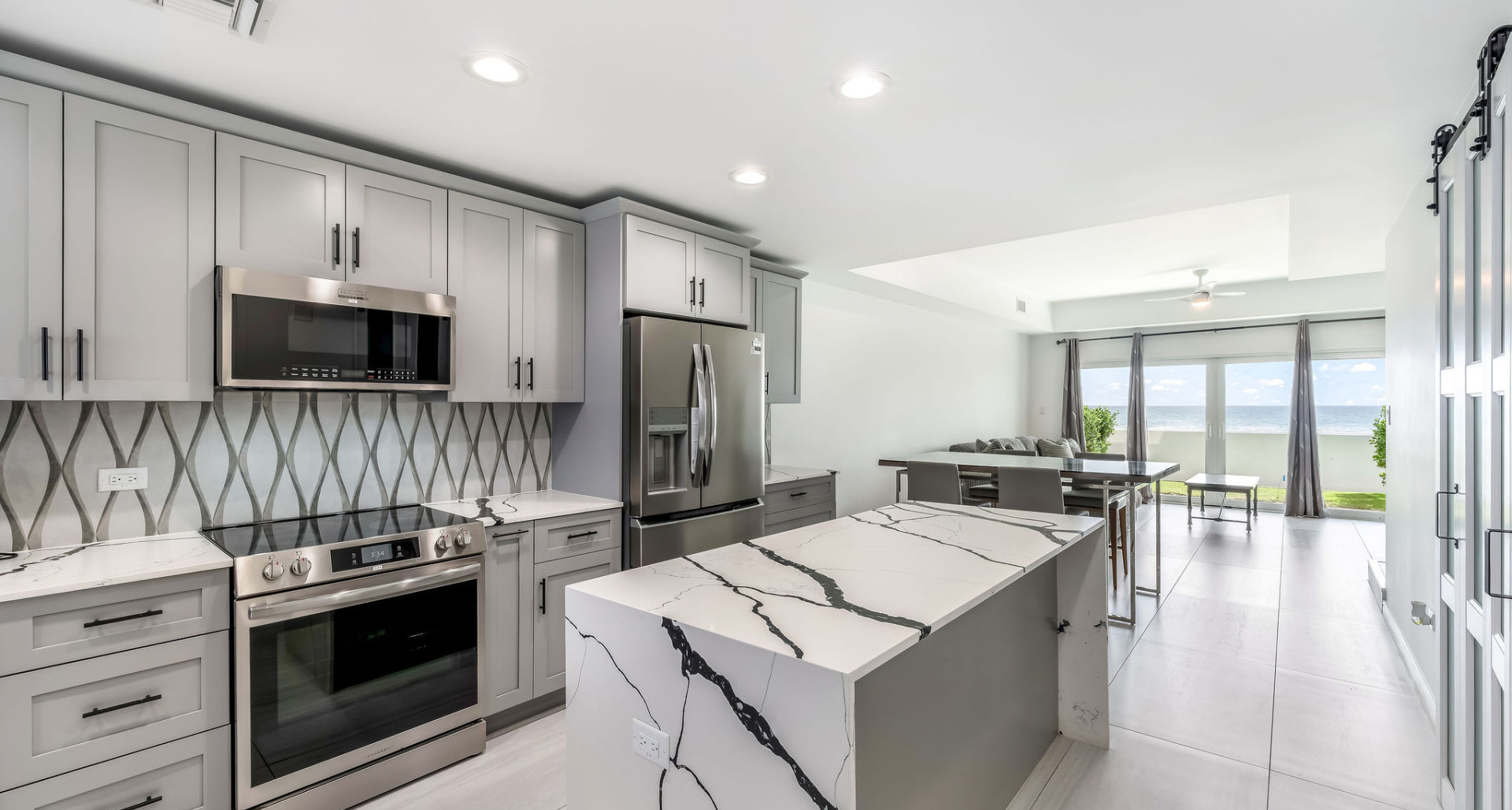 BY THE SEA #7 | SOUTH SOUND – OCEANFRONT END UNIT WITH RENOVATION REQUIRED